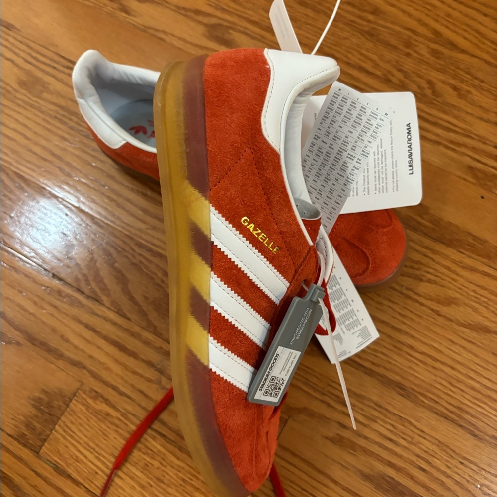 Adidas Red and White Athletic Sneakers with Classic Stripes. Sold out online